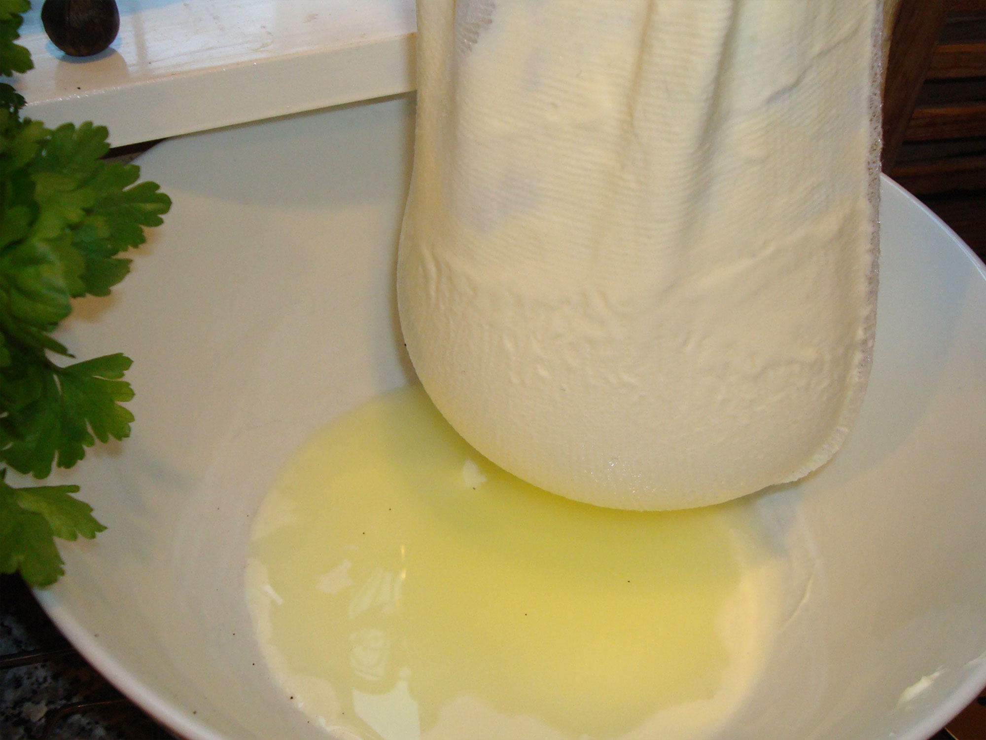 Labneh draining - yoghurt cheese copyright Lucy Hoffman 2012